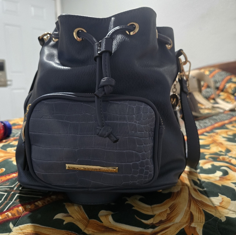 Stylish Navy Blue Backpack with Gold Accents